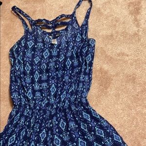 A blue paisley patterned romper